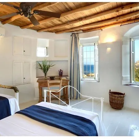 The Mykonian Beachfront Estate *